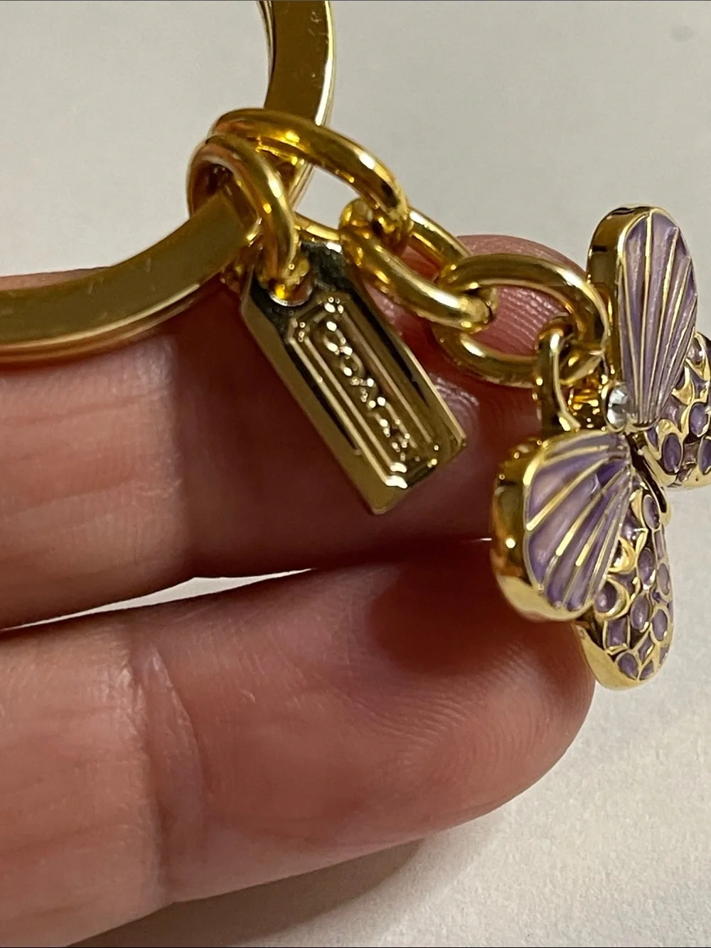 Coach Gold Butterfly Keyring with Purple Enamel and Coach Pen